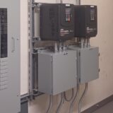 A view of electrical panels and voltage drives